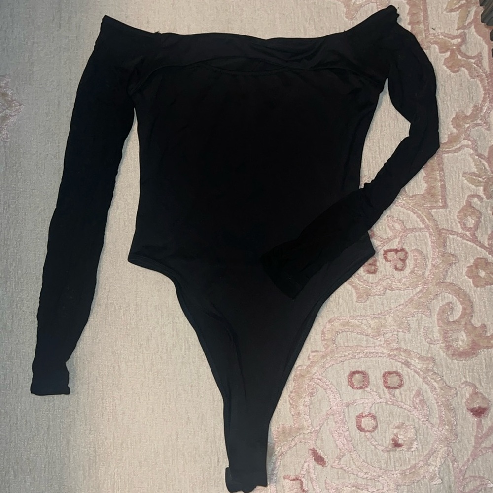 Black cut out bodysuit with mesh sleeves